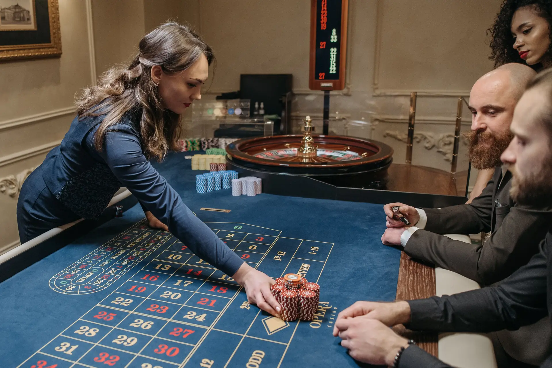 Roulette wheel and dealer